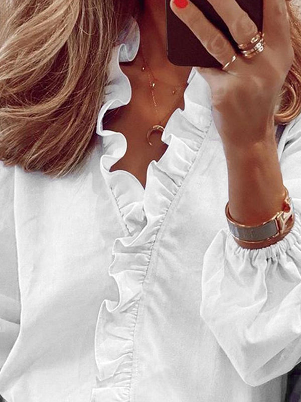 Vika | Blus med Puffärmar, Falbala-detaljer och Enfärgad V-ringning