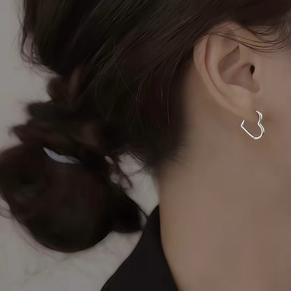 Hjärtformade örhängen i rostfritt stål i guld