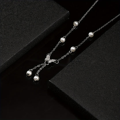 Nivala® | Handgjort Fjärilshalsband med Pärldetaljer